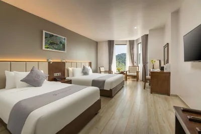 Habitación triple Deluxe con vista al mar — Cat Ba Paradise Hotel - Sirocco Sky Bar & Massage